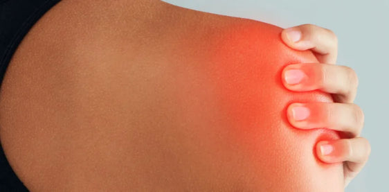 Hand with an aching, inflamed joint