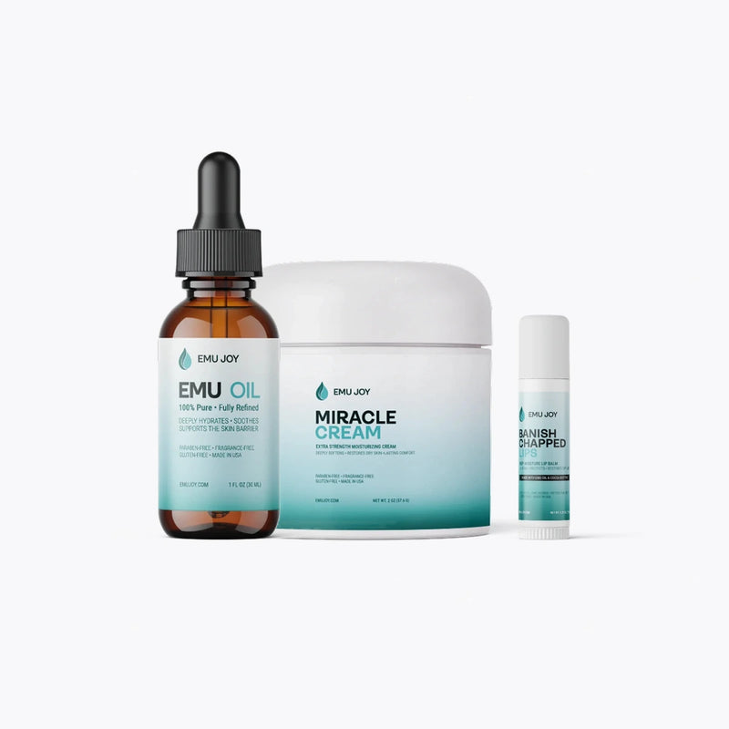 The Hydration Kit lineup: Pure Emu Oil bottle, Miracle Cream jar and Banish Chapped Lips balm