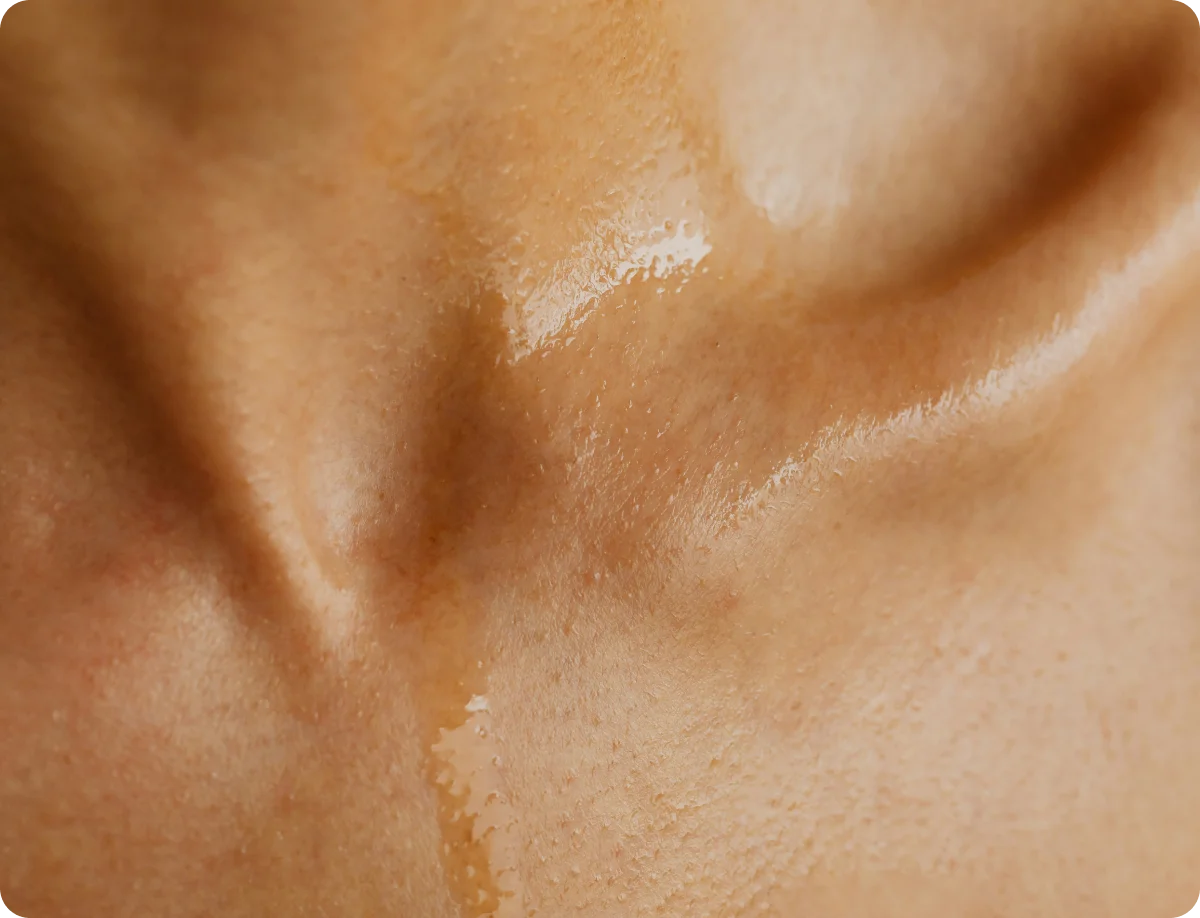 Close-up of skin with a light sheen of emu oil