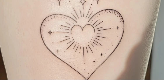 Freshly tattooed skin being moisturised during aftercare