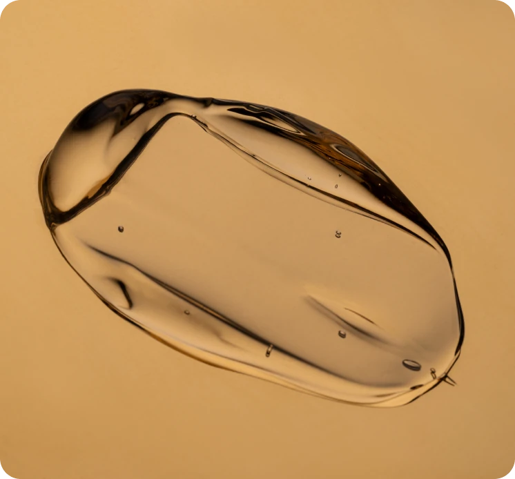 Clear smear of emu oil on a neutral background
